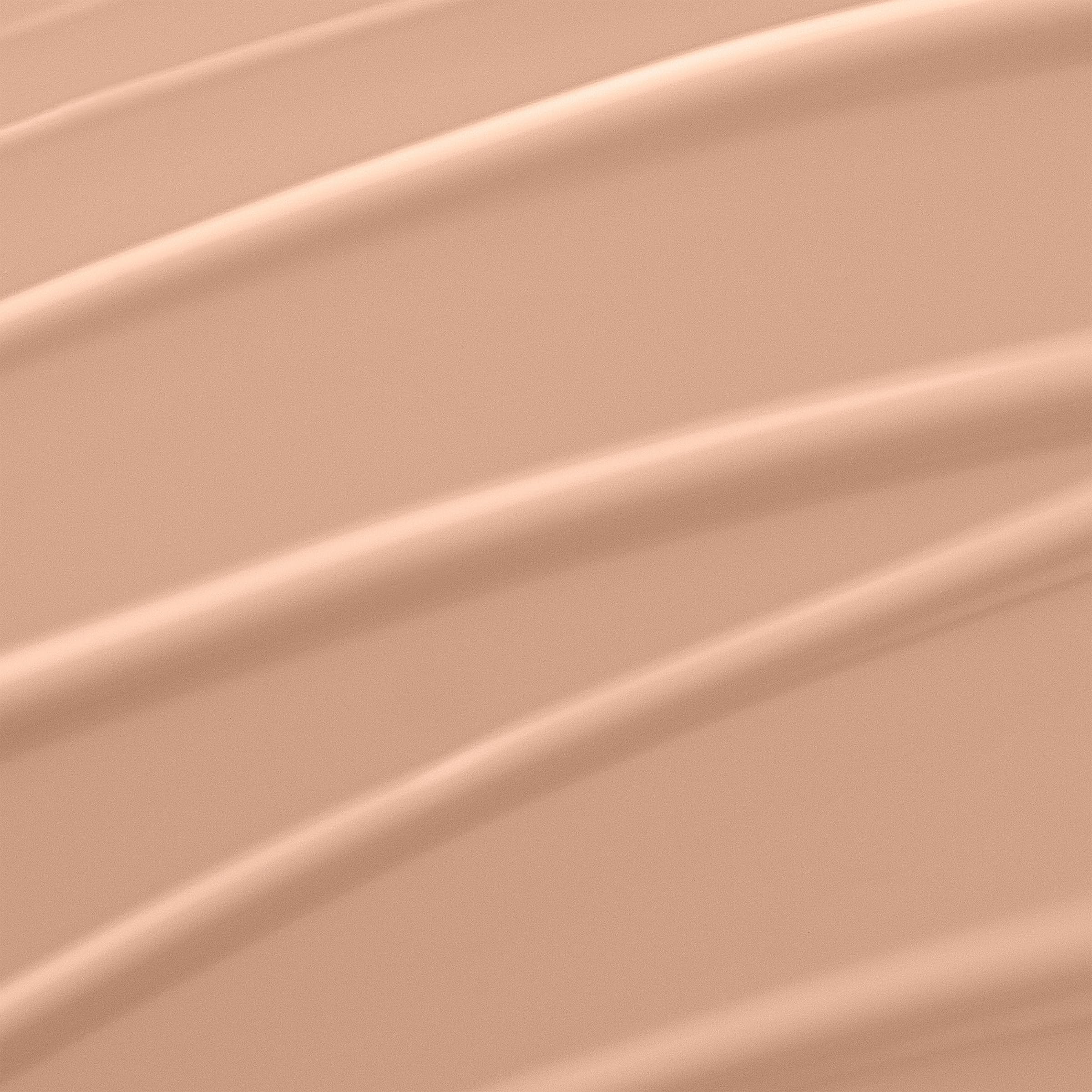 Lancôme Renergie Lift Foundation texture swirl demonstrates smooth blending for radiant skin.