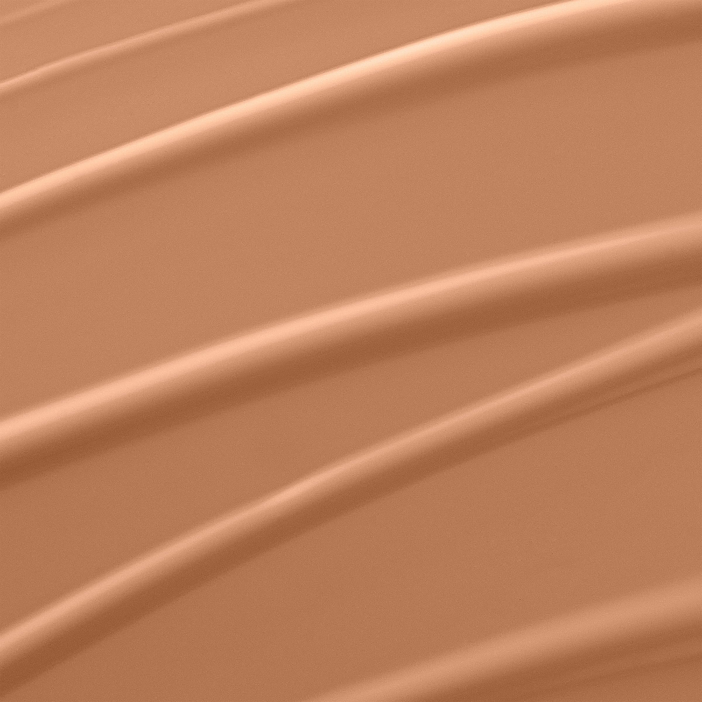 Lancôme Renergie Lift Makeup creamy texture swirls on skin for smooth, even tone.