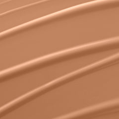 Lancôme Renergie Lift Makeup creamy texture swirls on skin for smooth, even tone.