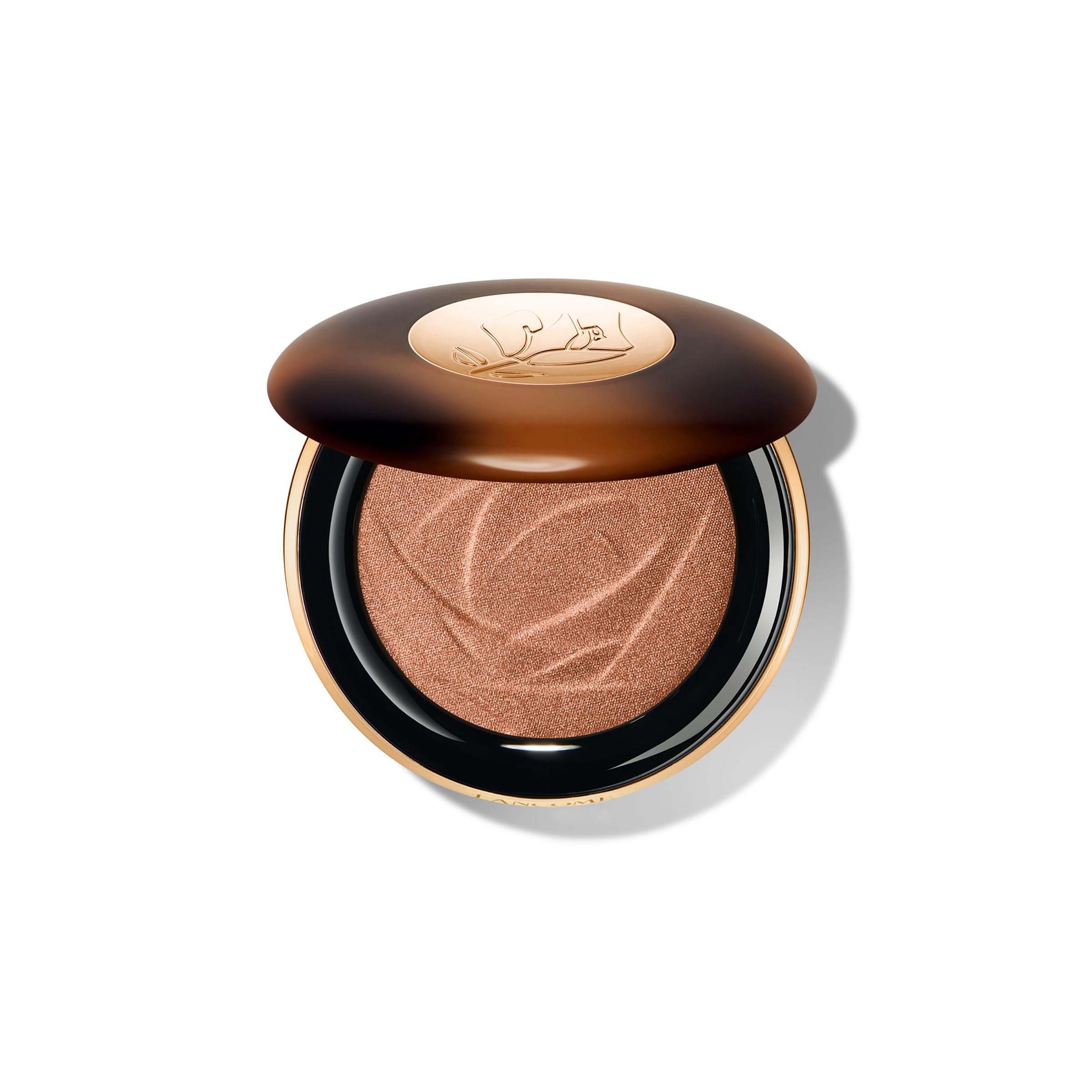 Lancôme Teint Idole C.E. highlighter bottle closeup for long-lasting luminous glow.
