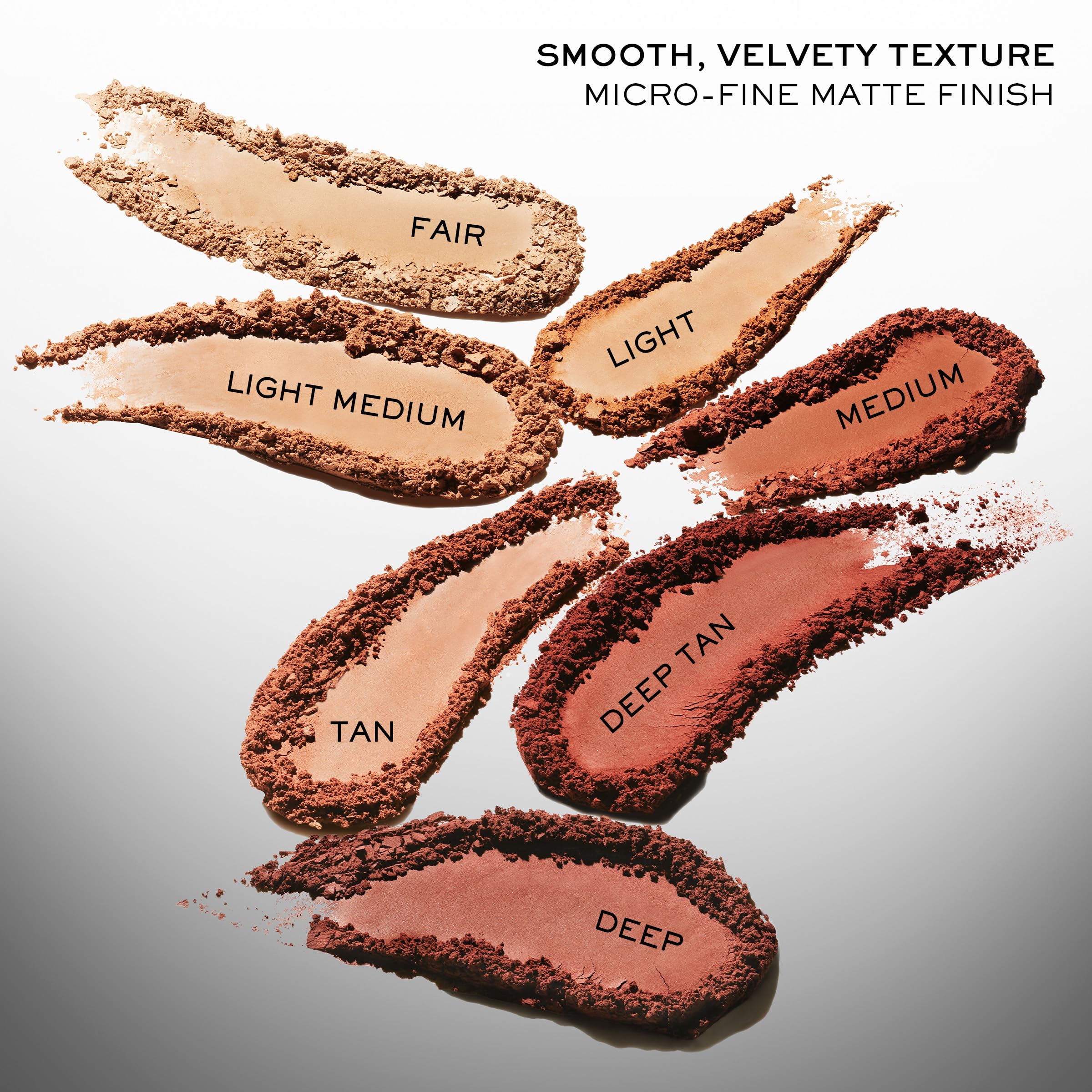 Lancôme bronzer on a fluffy brush for easy, everyday application