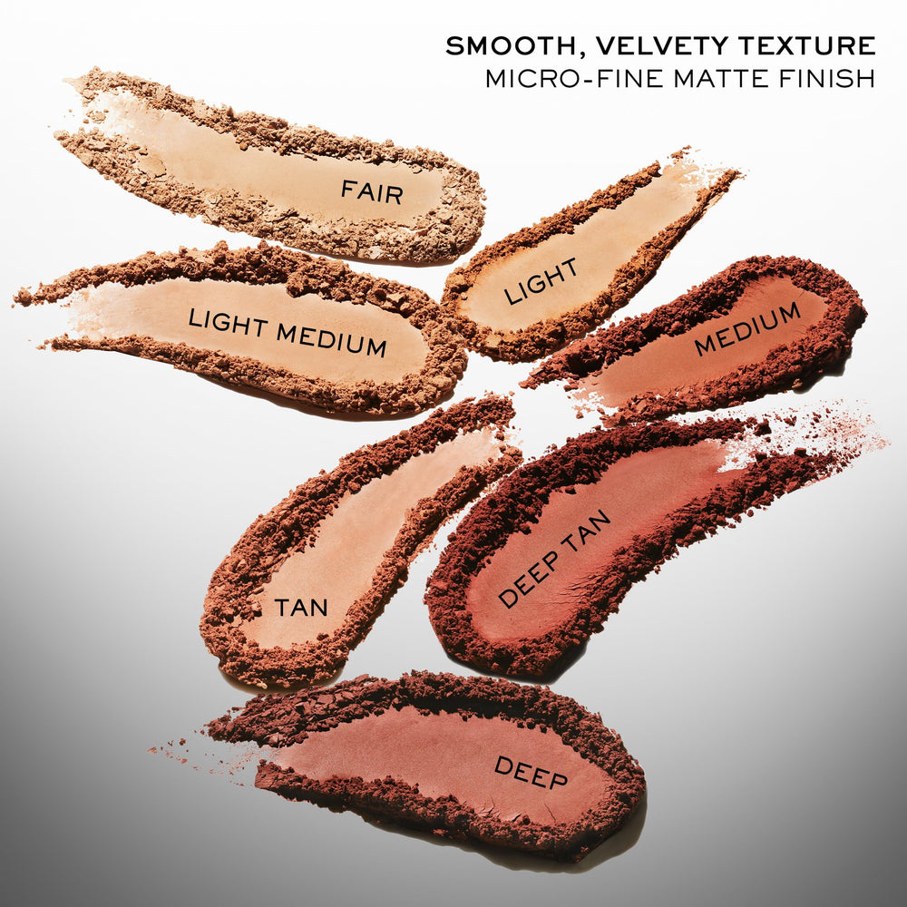 Lancôme bronzer on a fluffy brush for easy, everyday application