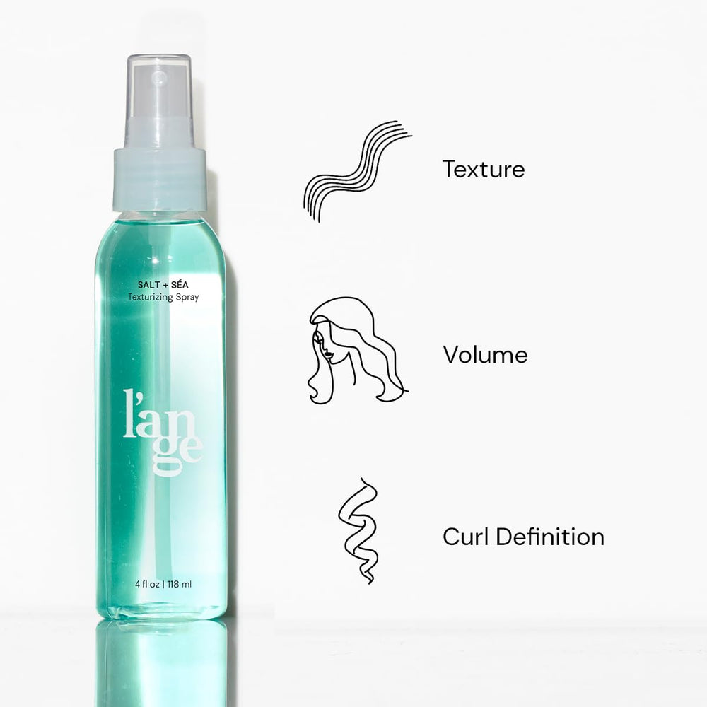 L'ANGE HAIR model with beachy waves and light matte finish.