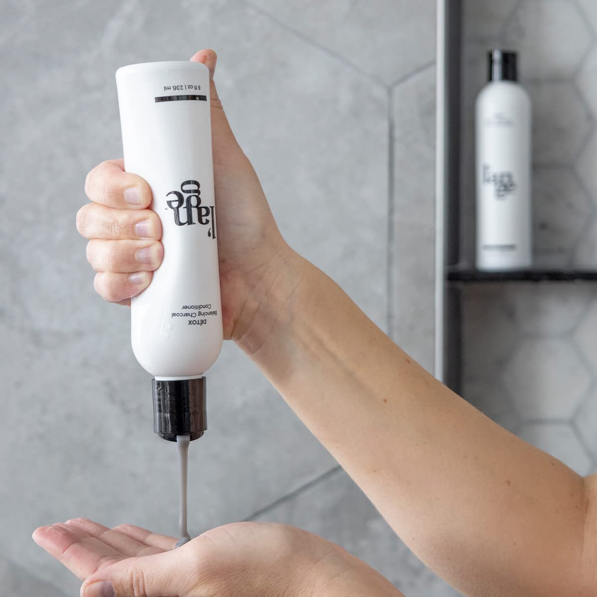 L'ANGE HAIR Detox Charcoal Conditioner close-up label highlights sulfate-free formula.