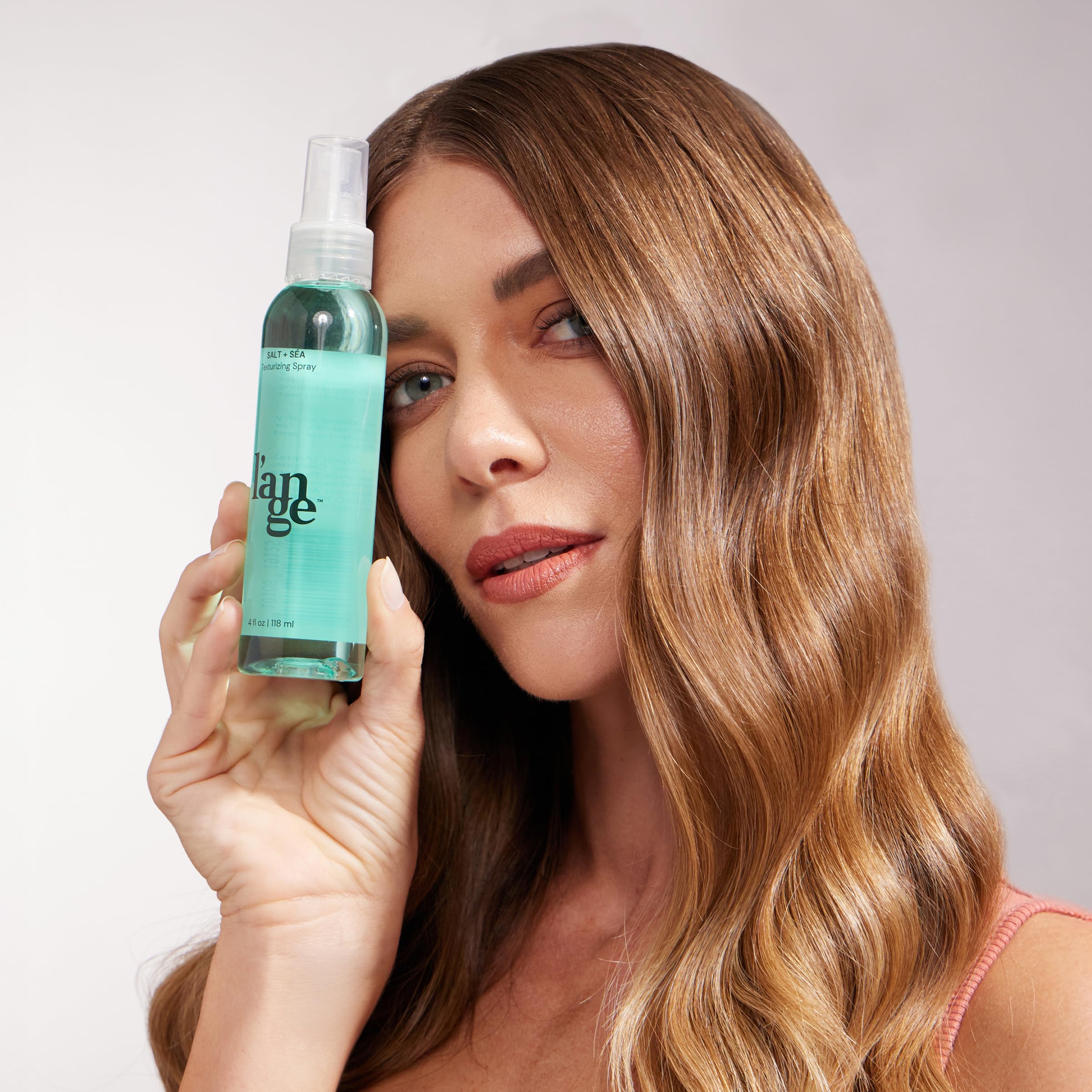 L'ANGE HAIR matte finish texture spray for lifted roots on fine hair.
