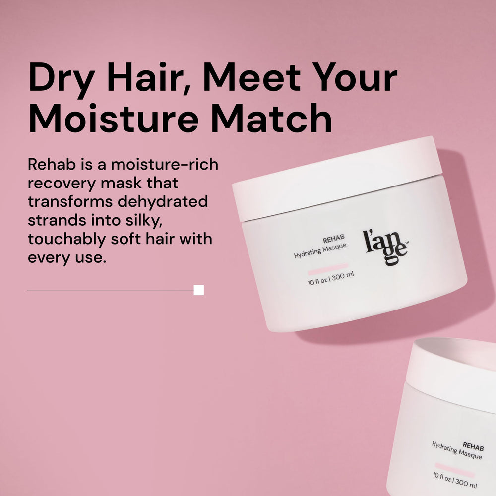 Whipped creamy texture shown while applying Rehab Hydrating Masque to damp hair for manageability.