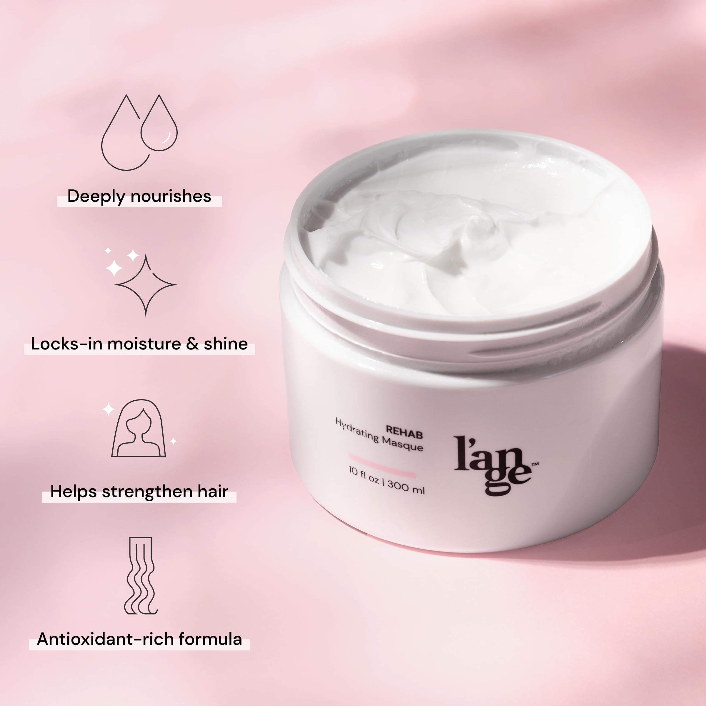 Close-up of L'ANGE HAIR Rehab Hydrating Masque for stronger, shinier strands after treatment.