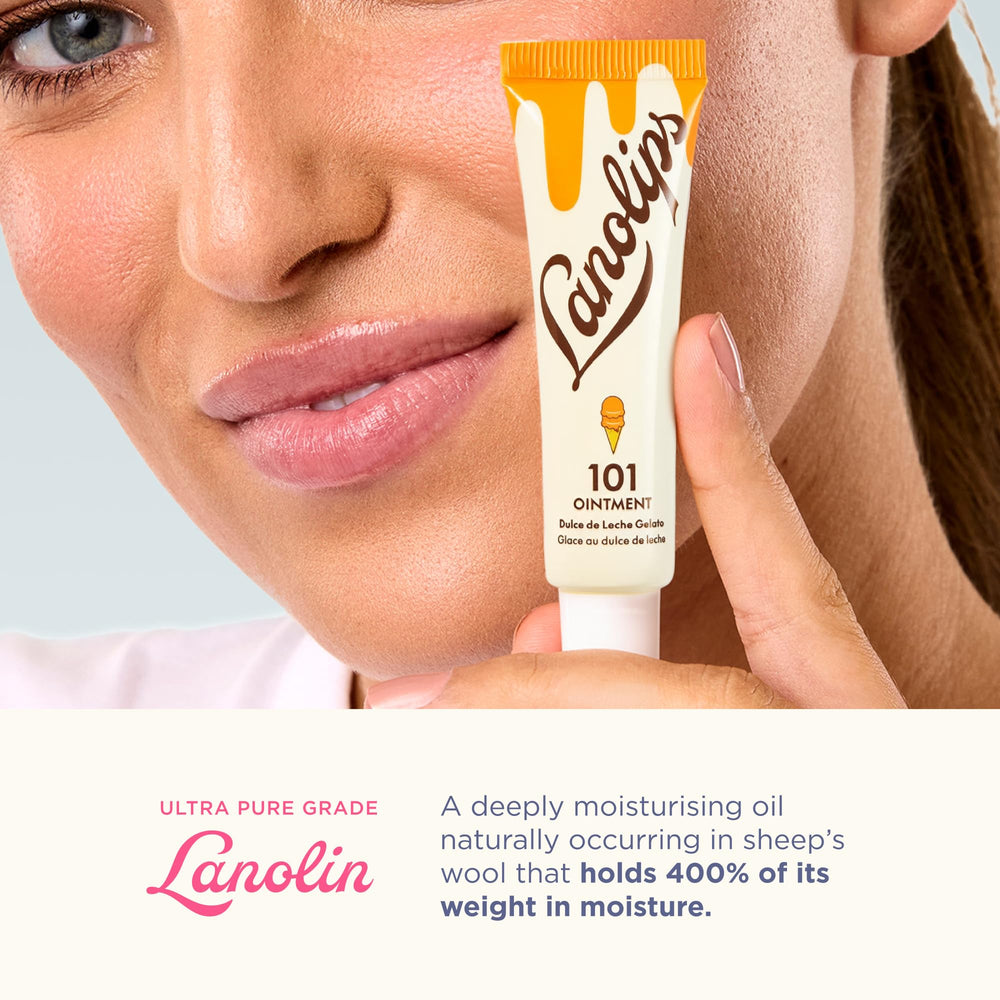 Applying Lanolips 101 Ointment on lips for smooth results.