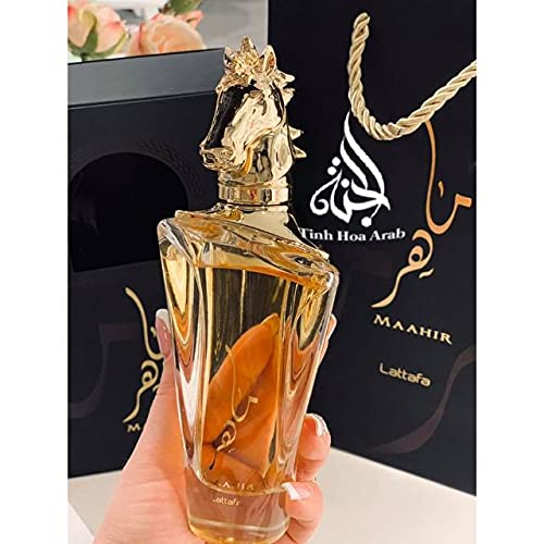 Lattafa Maahir mid notes jasmine, peony, lily create a refined floral aura.