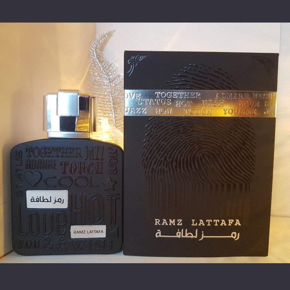 Lattafa Ramz Silver base notes vanilla tonka and guaiac wood for warmth.
