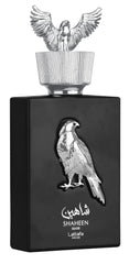Lattafa Shaheen Silver bottle pour highlights a bright citrus opening for daily wear.