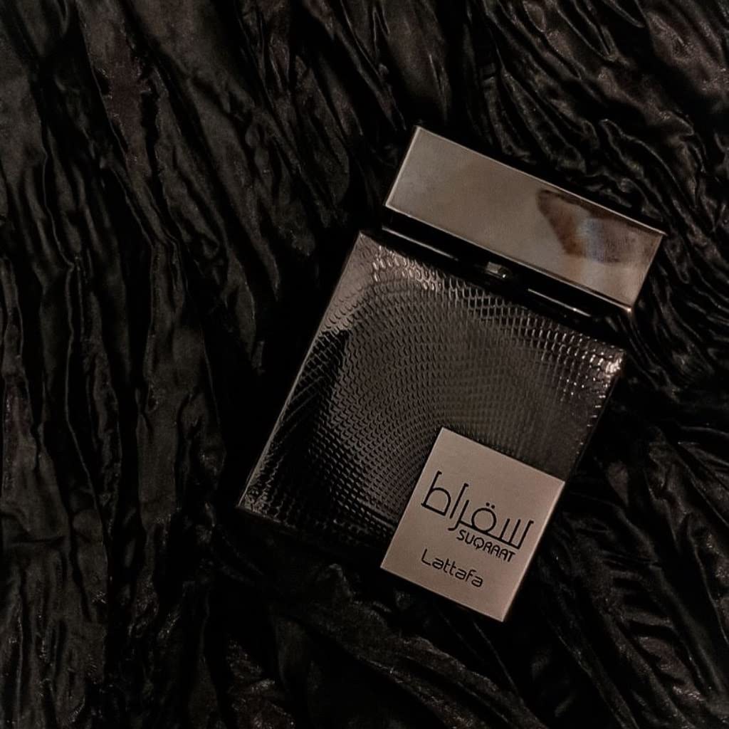 Lattafa Suqraat bottle angled shot, hints at warm musk and lavender allure.