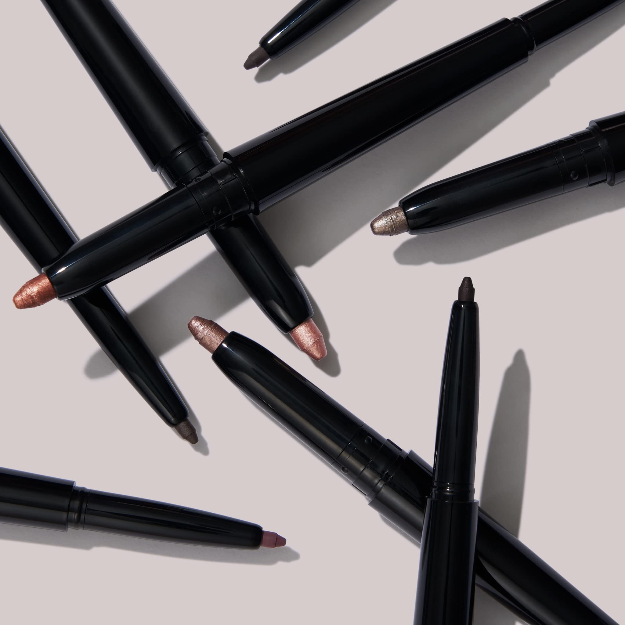 Laura Geller New York Swipe-n-Line effortless glide from applicator to lid.