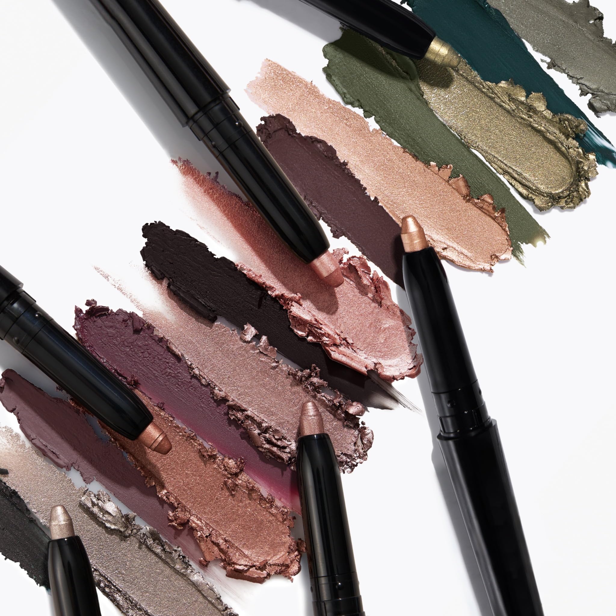 Waterproof, cream-to-powder eyeshadow-stick in use