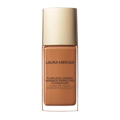 Laura Mercier Flawless Lumière foundation bottle close-up showing luminous finish