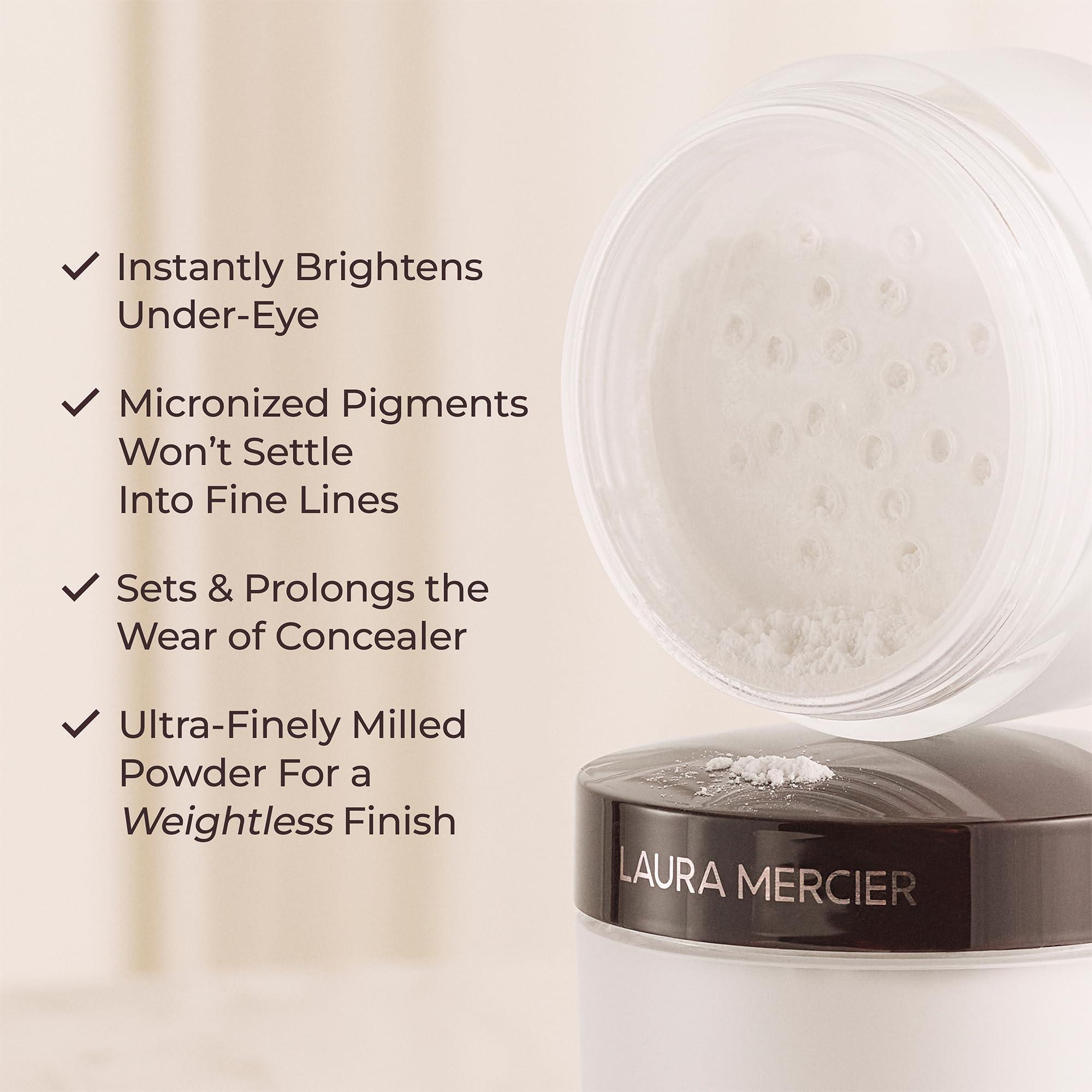 Laura Mercier Secret Brightening Powder swatch highlighting color correction around the eye area.