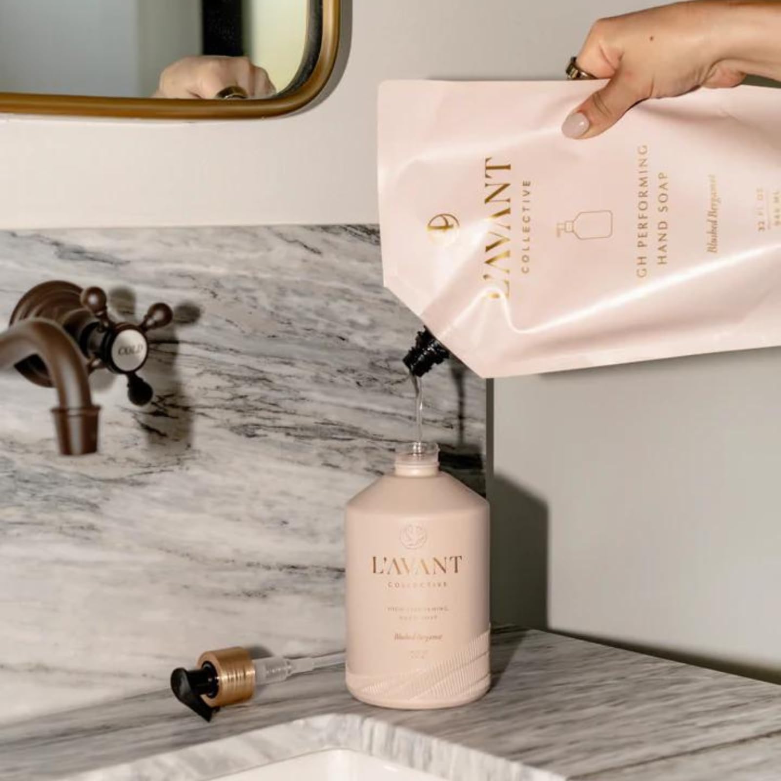 L'AVANT Collective amber-cedar notes offer warm, lasting fragrance.