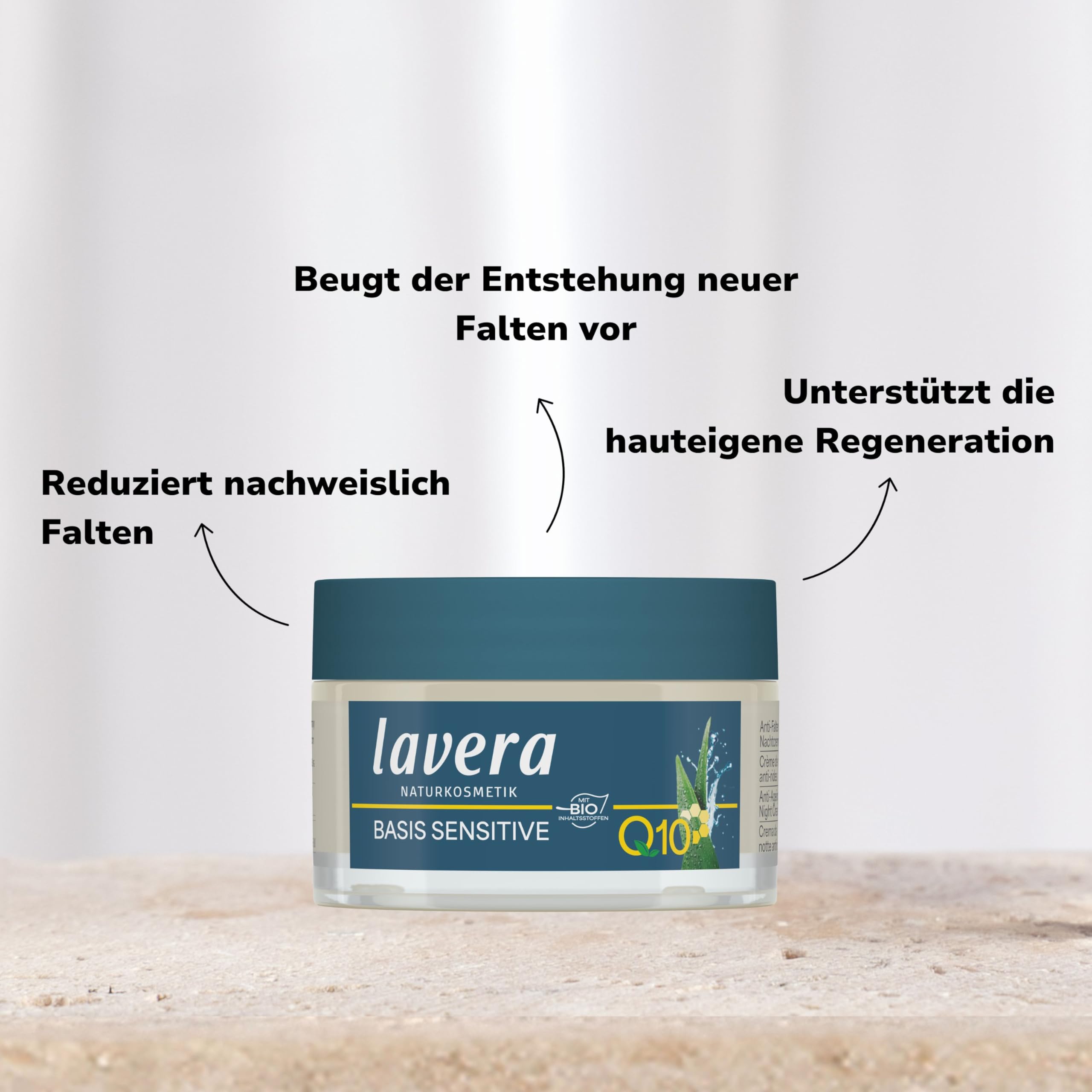 Lavera anti-aging night cream on skincare routine display in a bathroom setting.