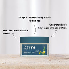 Lavera anti-aging night cream on skincare routine display in a bathroom setting.