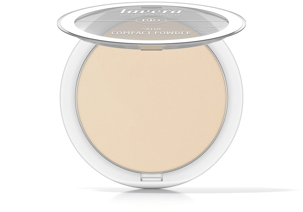 Lavera Satin Compact Powder Nude 02 applied with brush for quick oil control touch-ups.