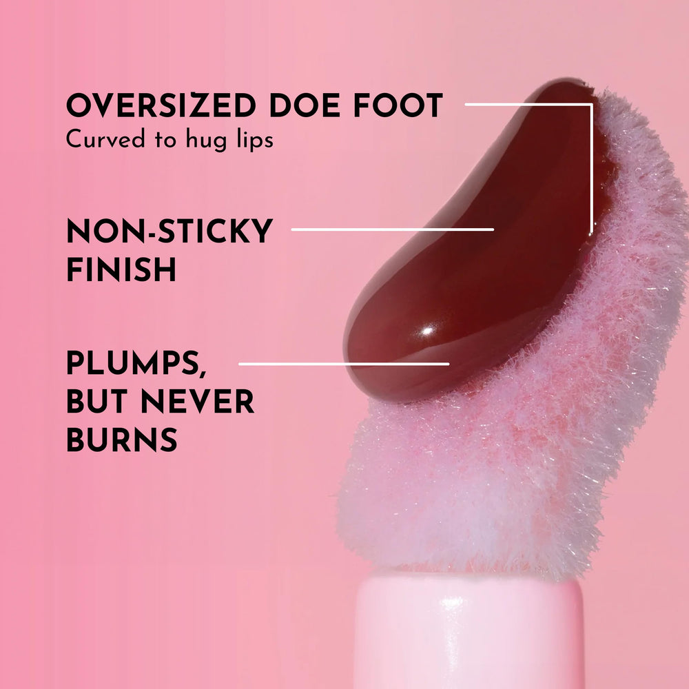 Lawless Forget The Filler gloss applicator hugging lips for comfort