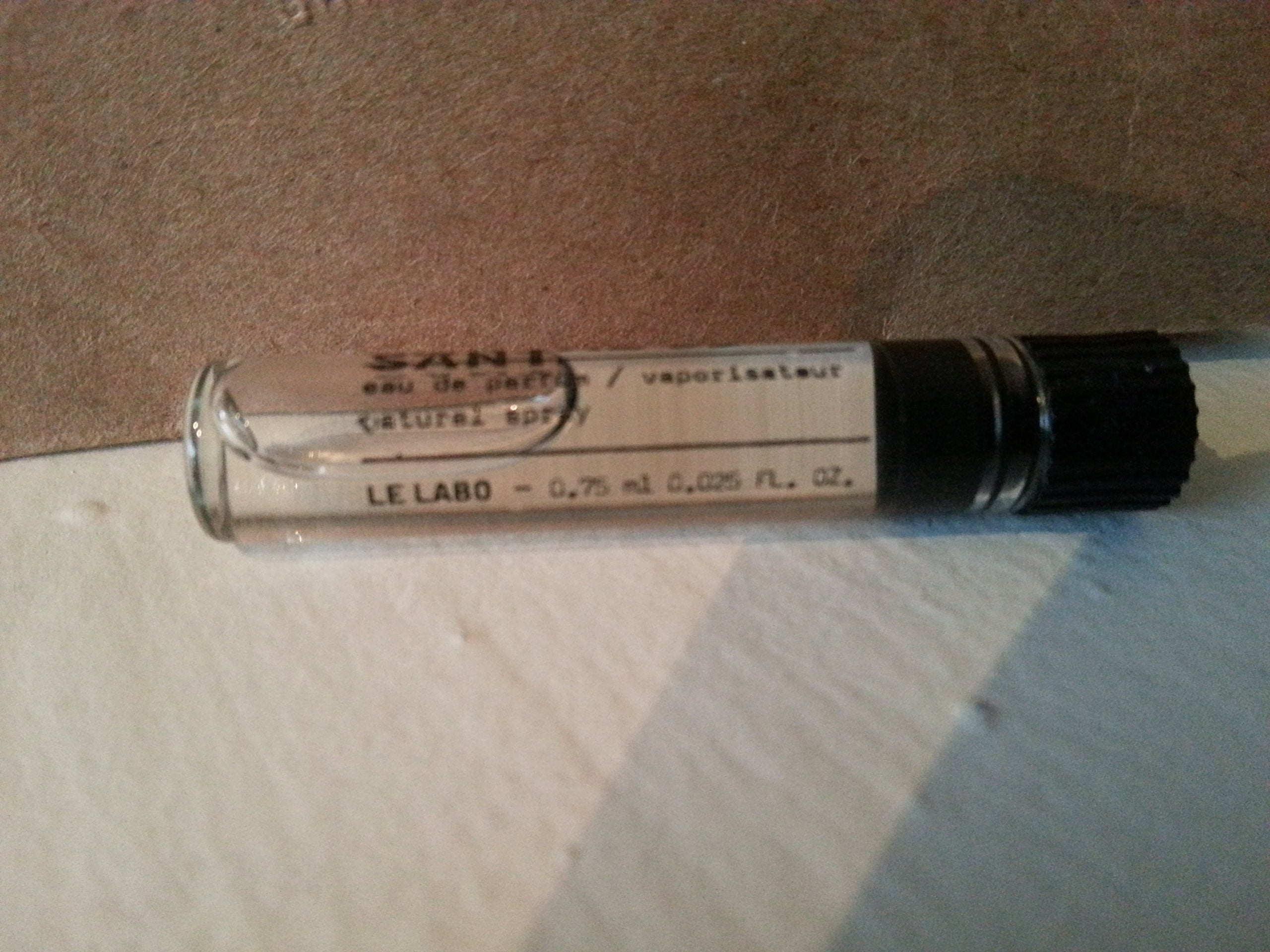 Le Labo Santal 33 bottle close-up highlighting premium design and fragrance vibe.