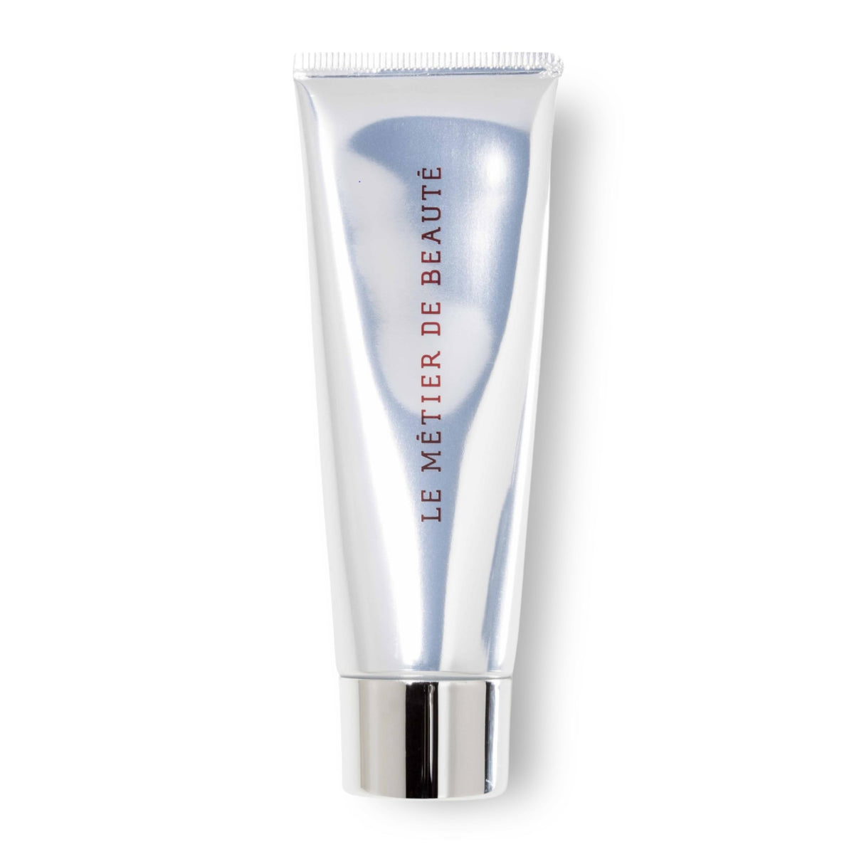 Le Metier De Beaute MĒTIER Peau Vierge Complexe bottle closeup showing radiant finish.