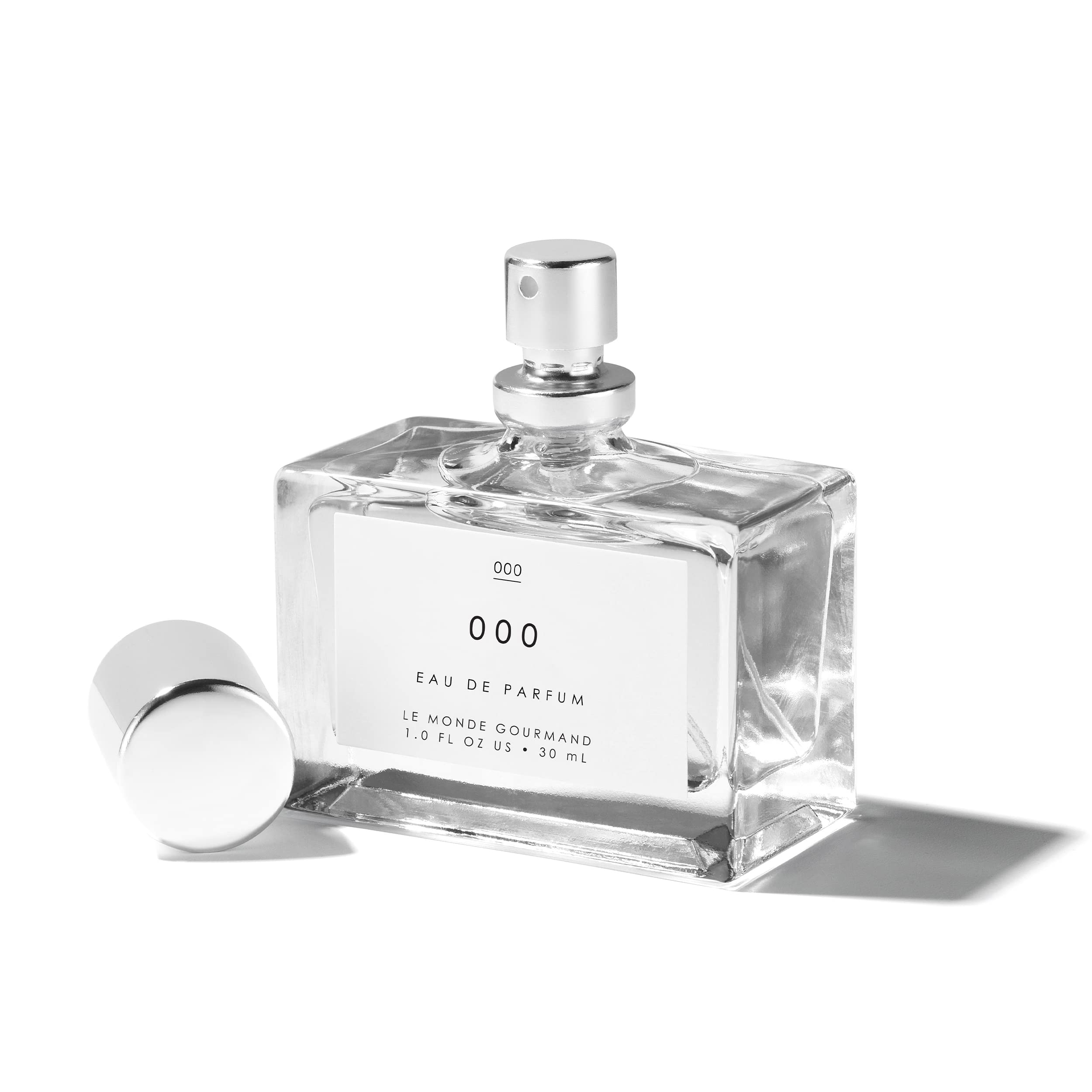 Le Monde Gourmand 000 spray on wooden surface conveys versatile everyday scent