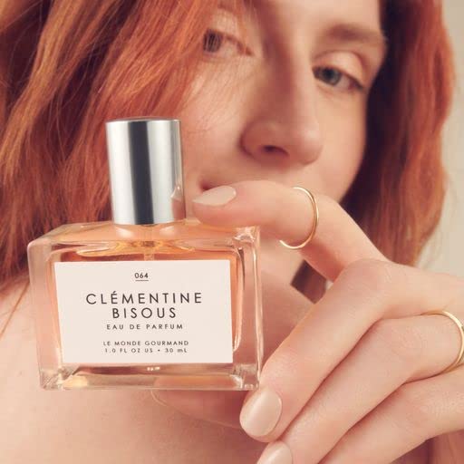 Clementine Bisous sandalwood base note dominates the profile