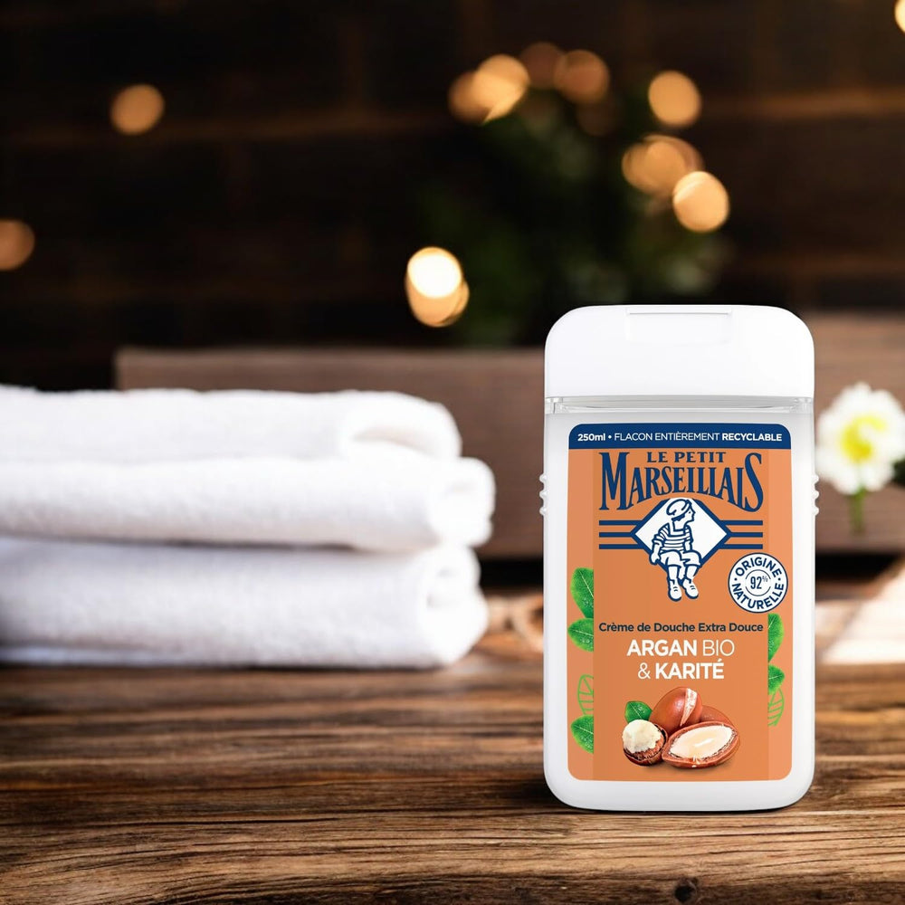 Le Petit Marseillais Argan BIO Body Wash closeup texture highlights creamy emulsion for softness.