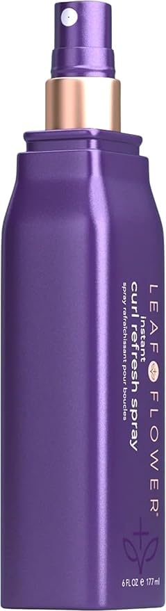 Leaf & Flower Curl Refresh Spray misting on hair for frizz control