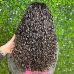Leaf & Flower Instant Curl Defining Cream applied to hair shows frizz control and hydration.