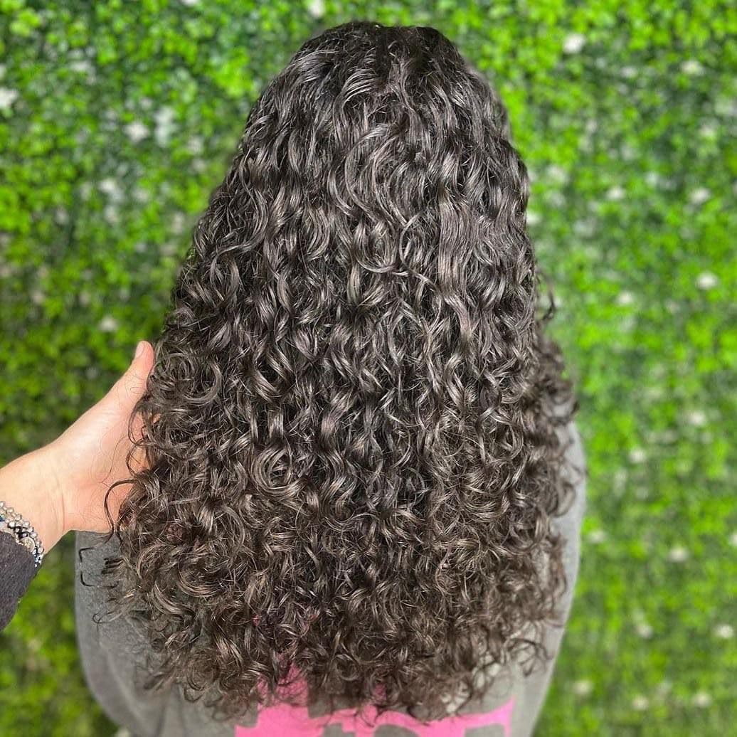Leaf & Flower Instant Curl Defining Cream texture closeup shows smooth alcohol-free formula for frizz reduction