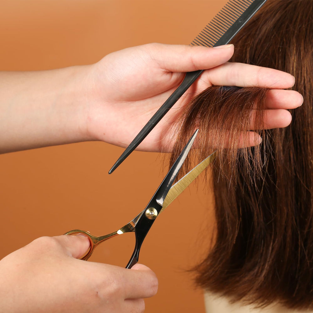 Lengnoyp black gold thinning scissors with textured blade for controlled thinning.