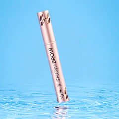 LeVaye Show Brow Serum applicator dipped into the bottle, ready for nightly use