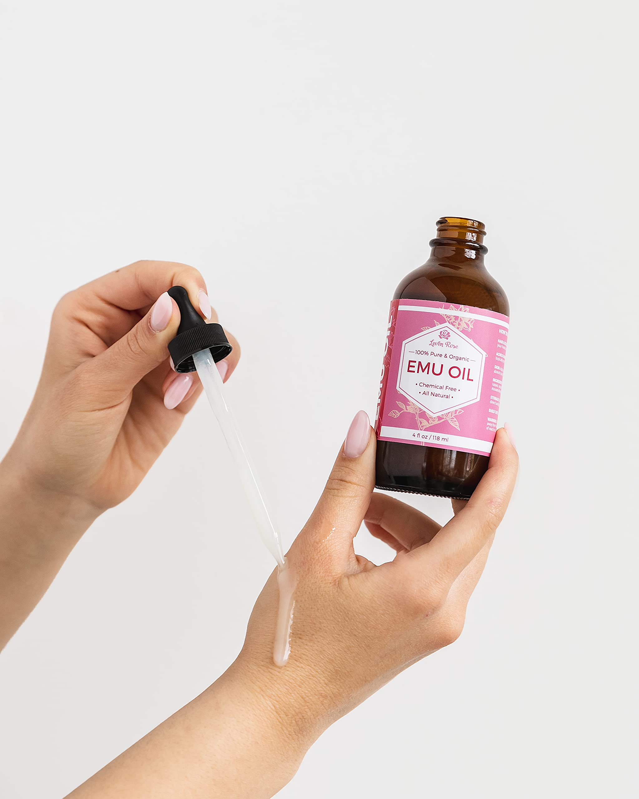 Applying Leven Rose Emu Oil to the face for a smooth, hydrated look.