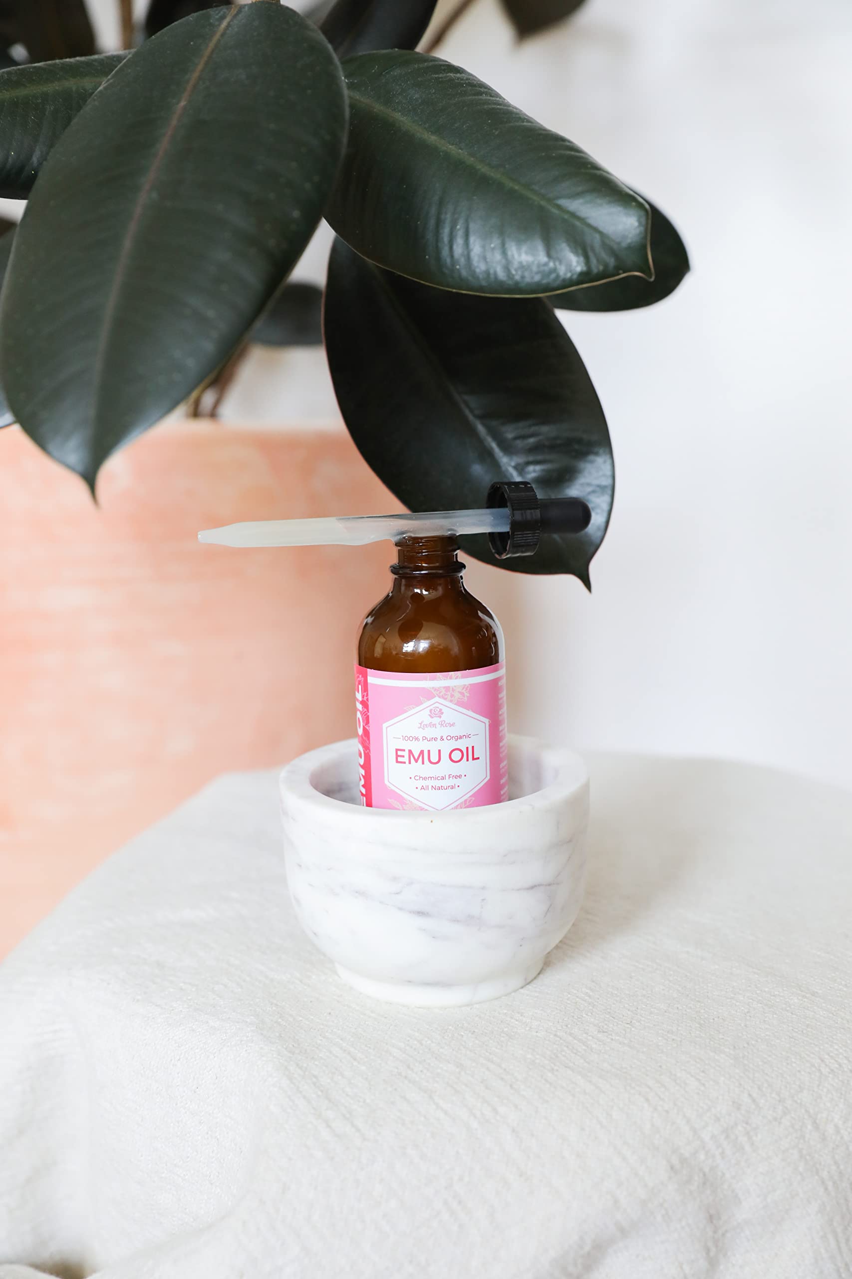 Hair ends treated with Leven Rose Emu Oil for added moisture and shine.