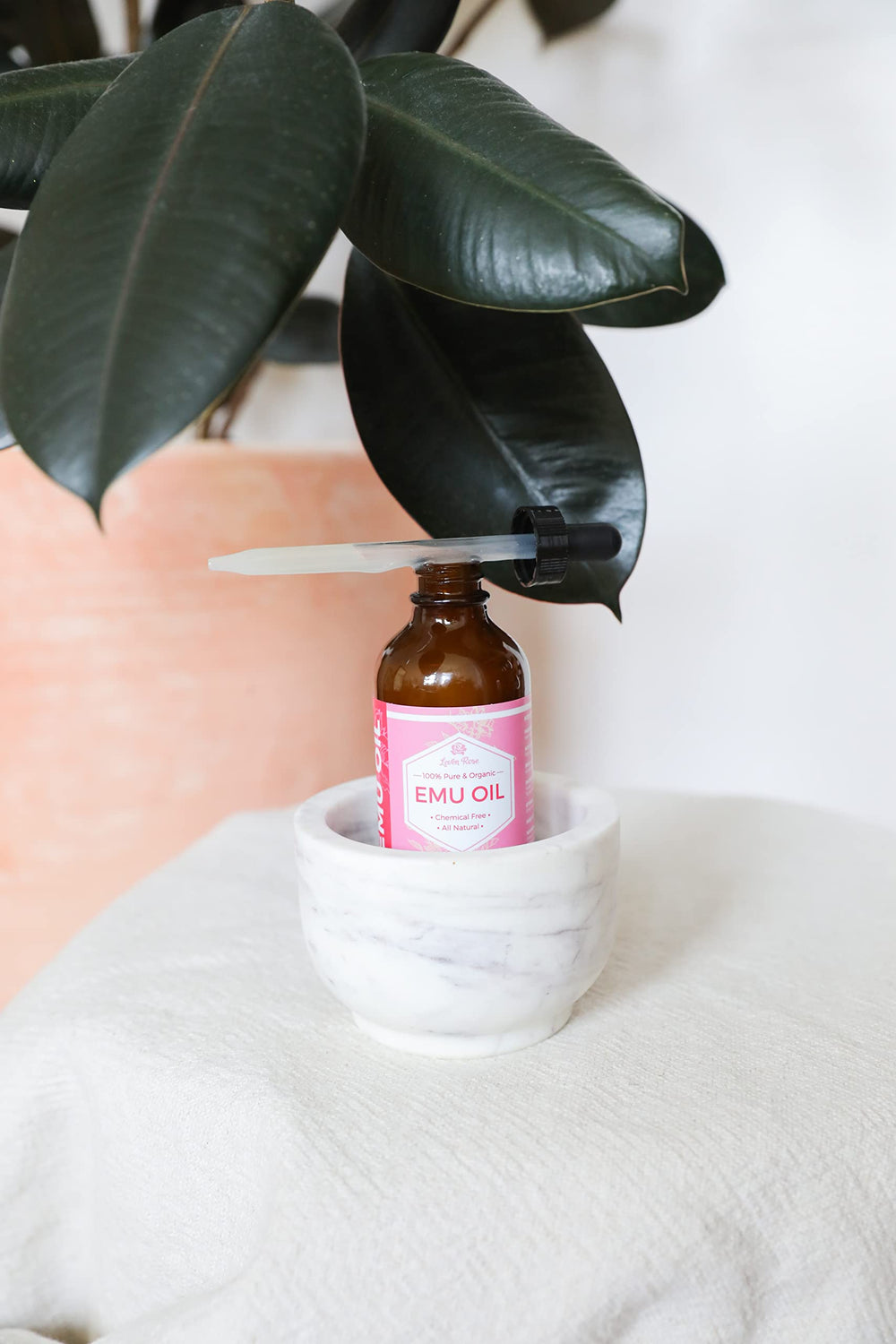 Hair ends treated with Leven Rose Emu Oil for added moisture and shine.