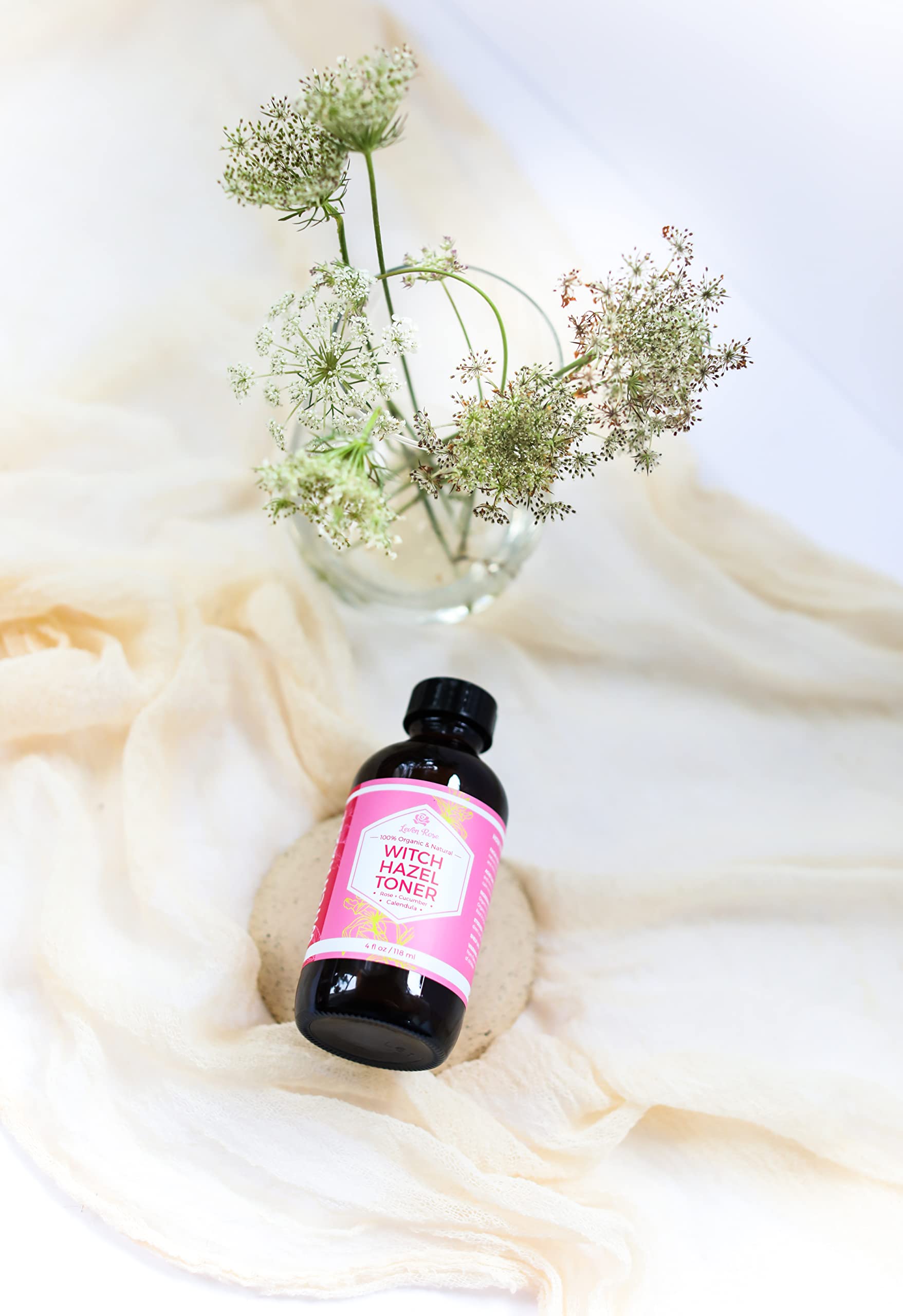 Amber bottle with organic, fragrance-free ingredients from Leven Rose.