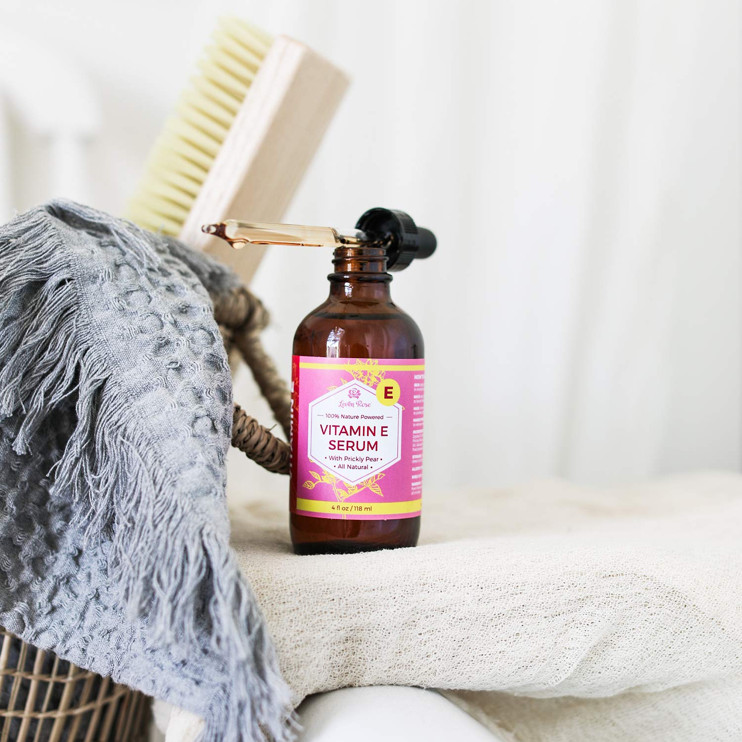 Leven Rose Vitamin E Oil Serum being applied to skin