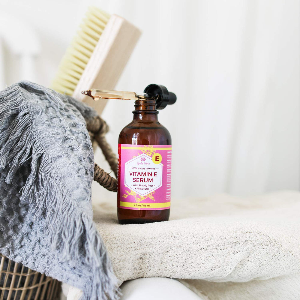 Leven Rose Vitamin E Oil Serum being applied to skin