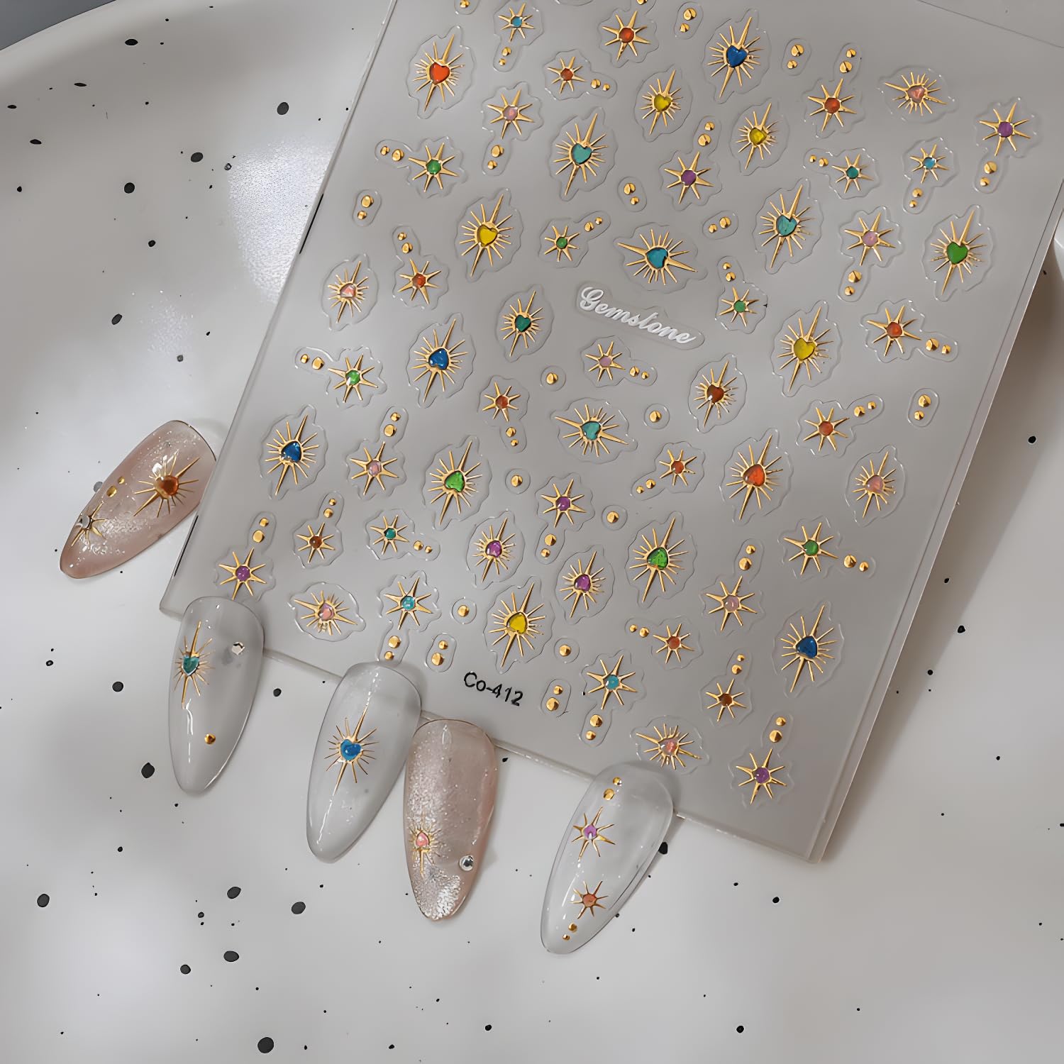 LIDUNANWU star nail stickers colorful rhinestones create sparkling manicure accents.