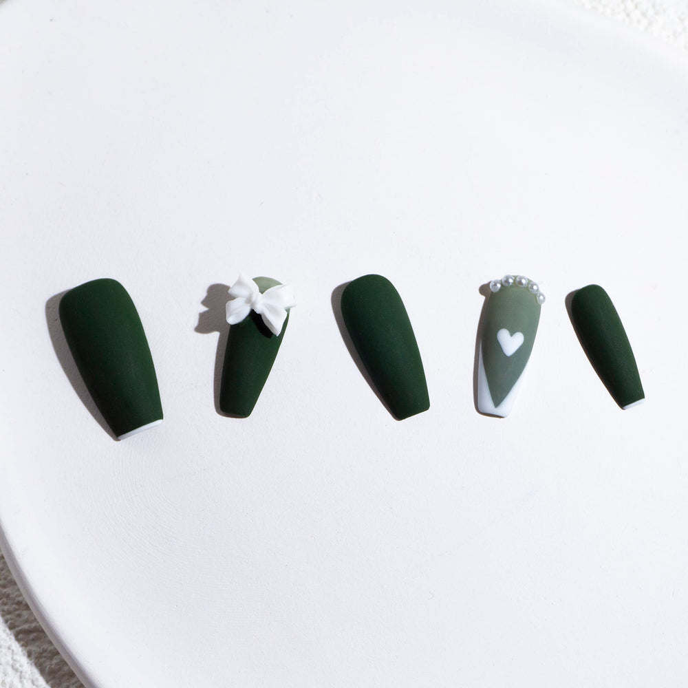 Light Rain hand-painted nails design in progress by an artist for a unique home manicure.