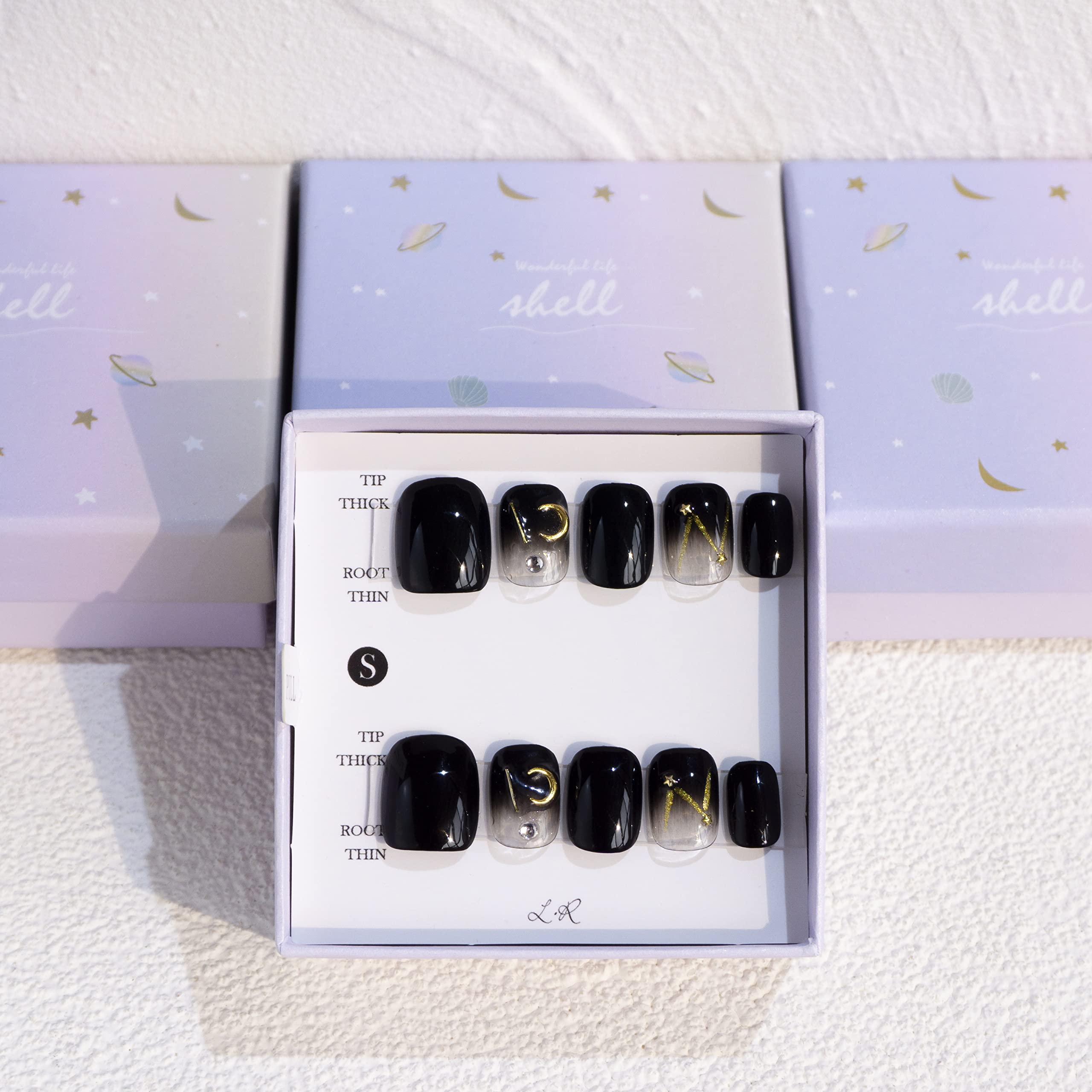 Light Rain hand-painted press-on nails with unique design for at-home elegance