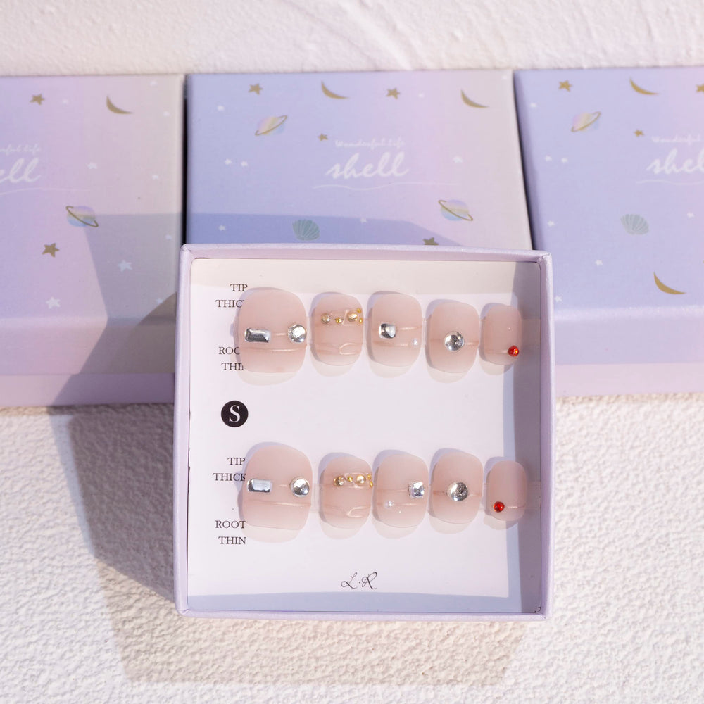 Light Rain handmade nails with a 3D gel finish for a salon-style look.