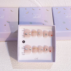 Light Rain handmade nails with a 3D gel finish for a salon-style look.