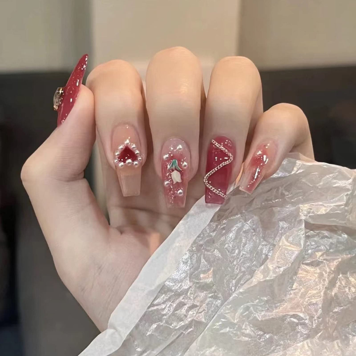 Light Rain hand-painted press-on nails with unique designer detail.