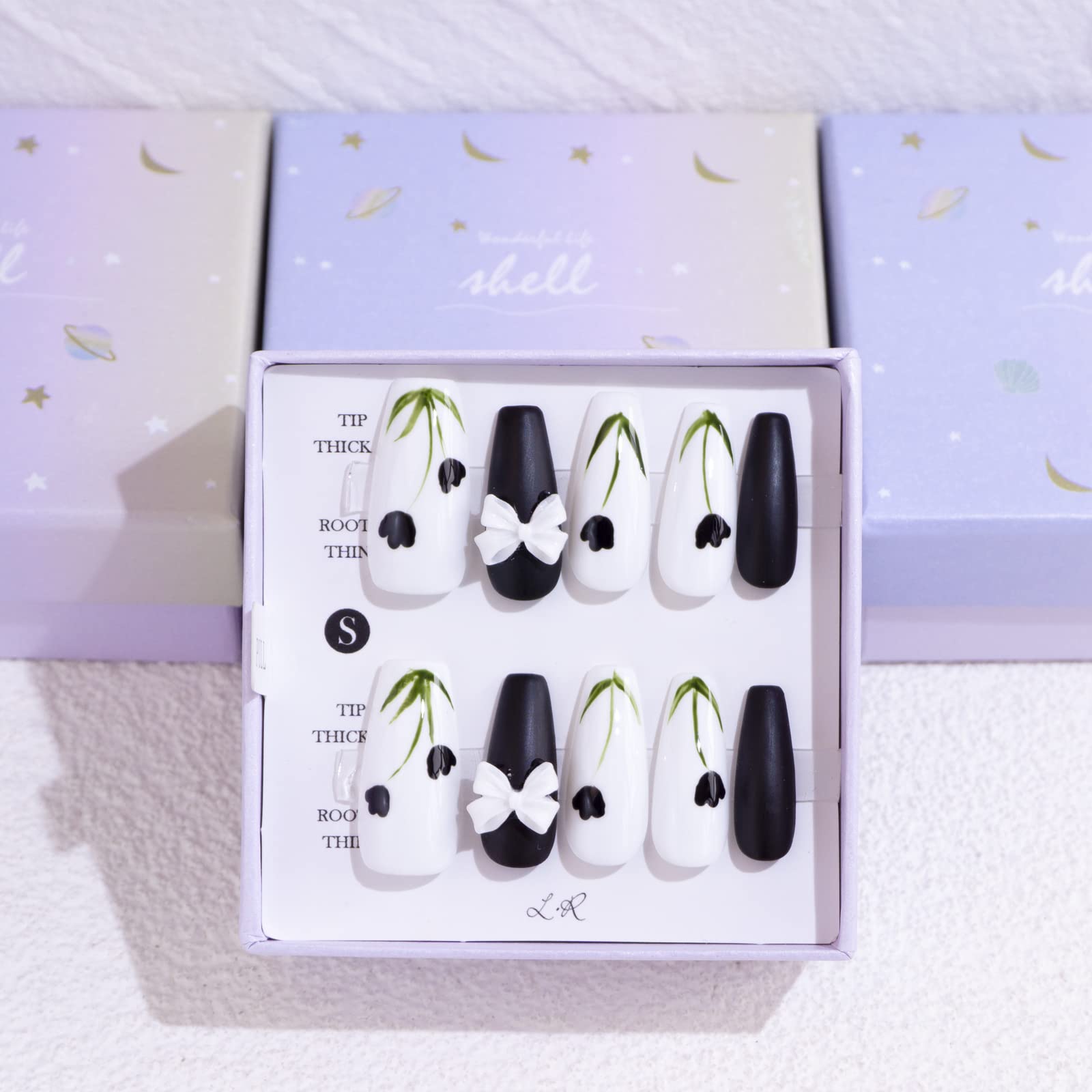 LIGHT RAIN medium press-on nails with 3D gel finish for salon-like results at home.