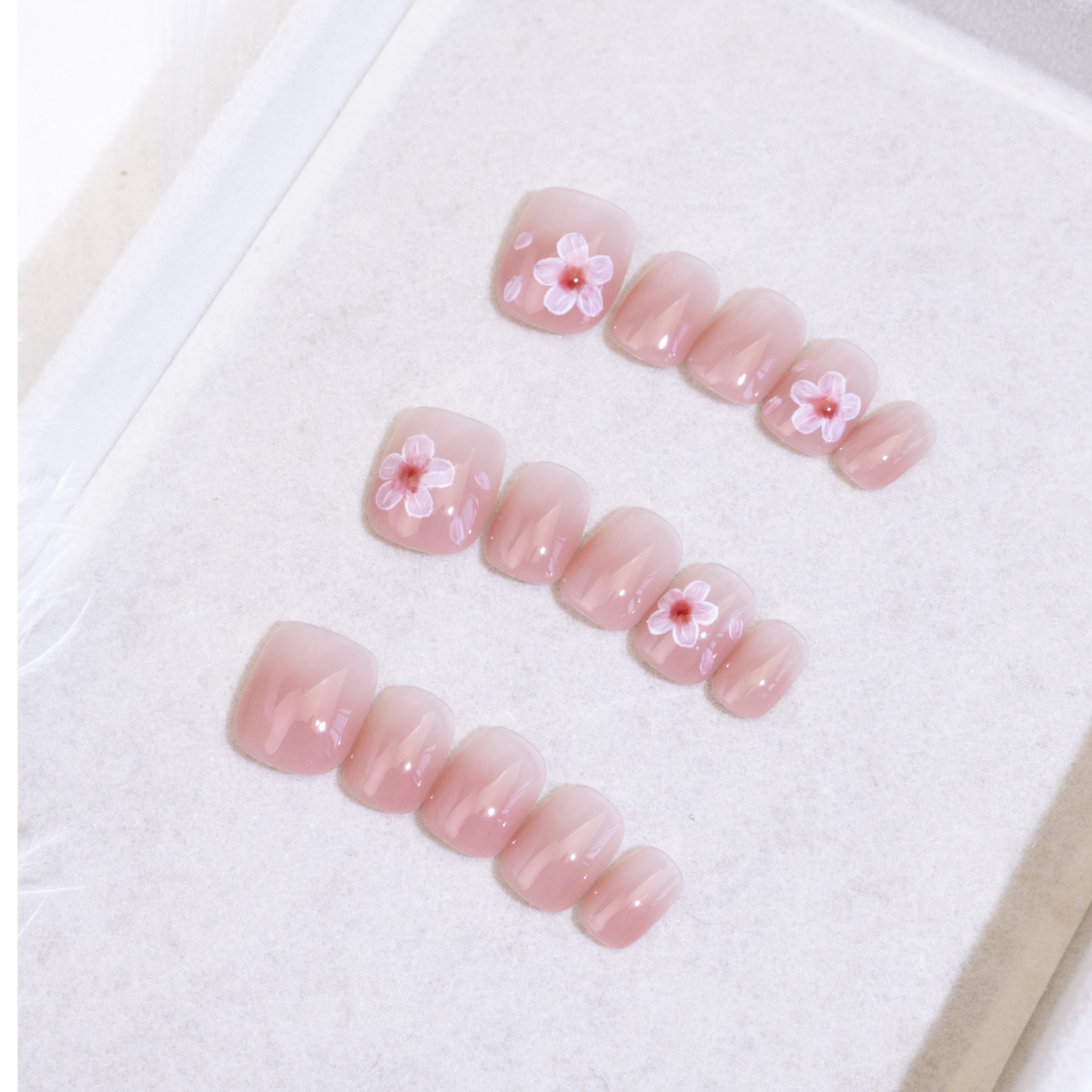 Light Rain medium-size press-on nails in a studio shot with a salon-quality finish.