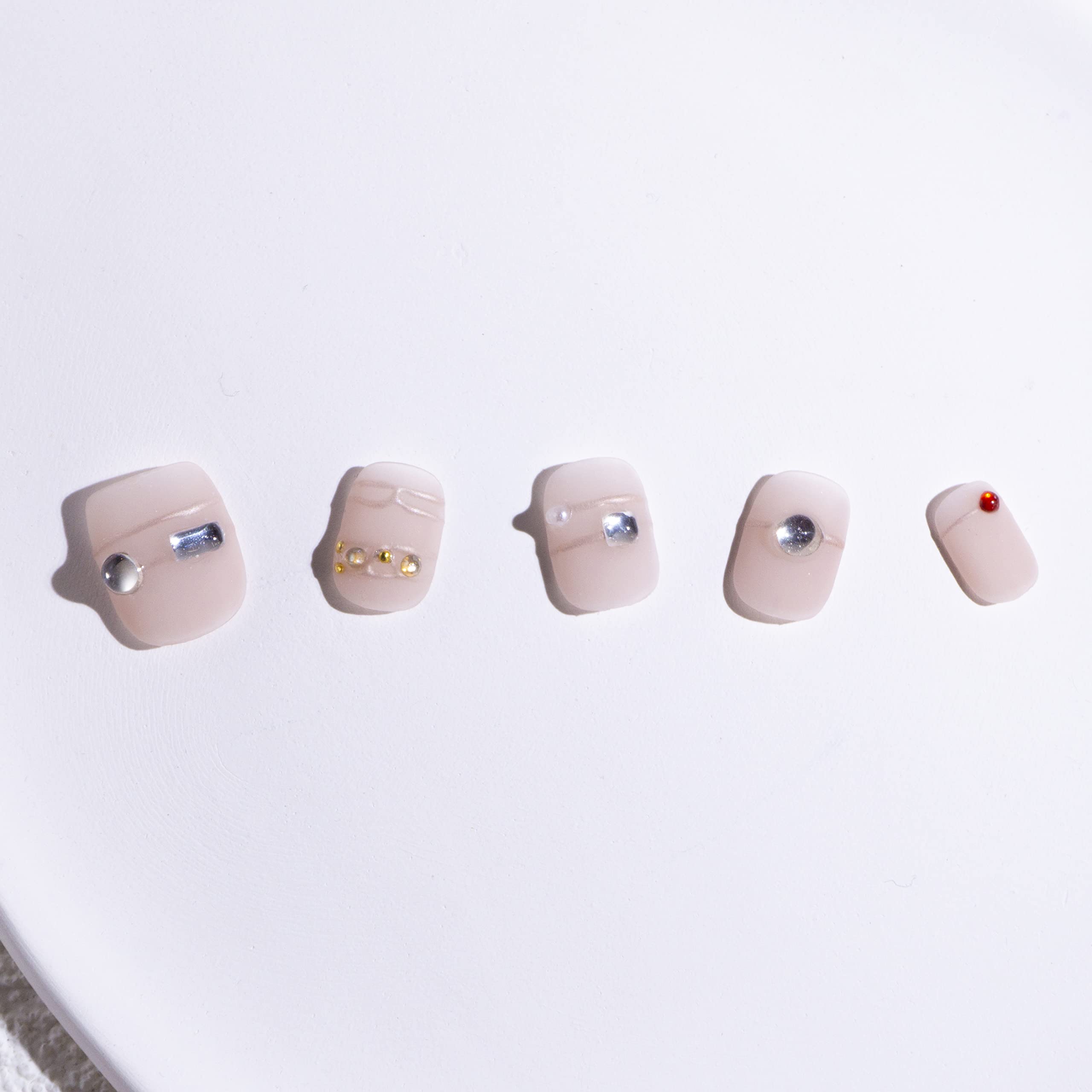 Light Rain medium-size press-on nails designed by a pro manicurist.